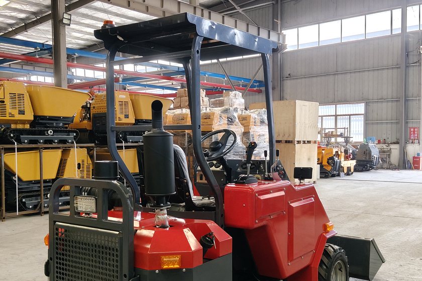 Machine assembly bay with site dumpers under build